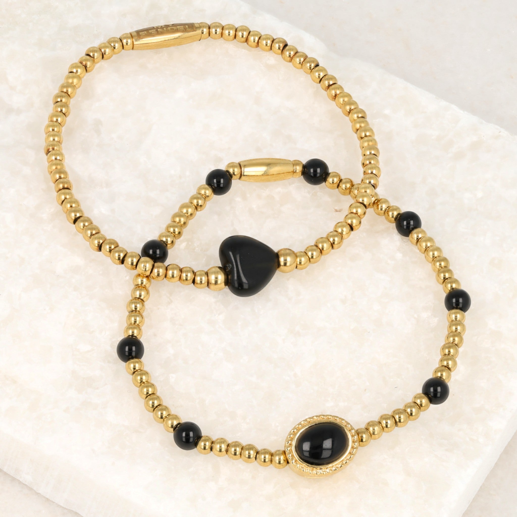 Gouden armband met Onyx hart