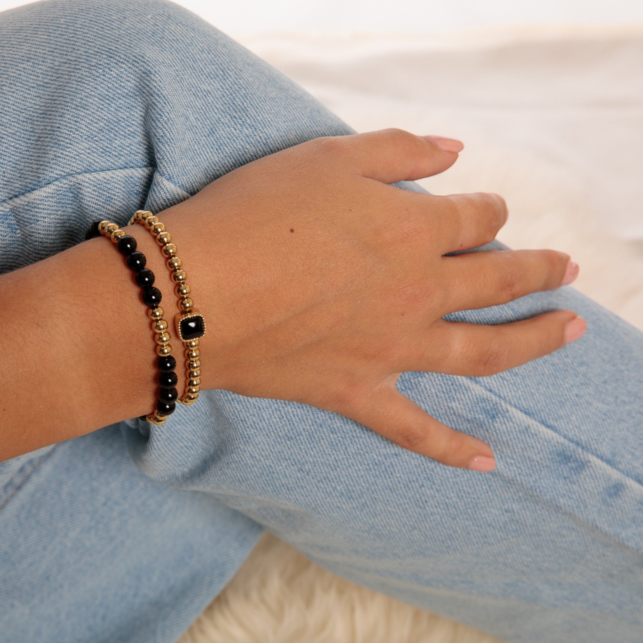 Gouden armband met vierkante Onyx edelstenen