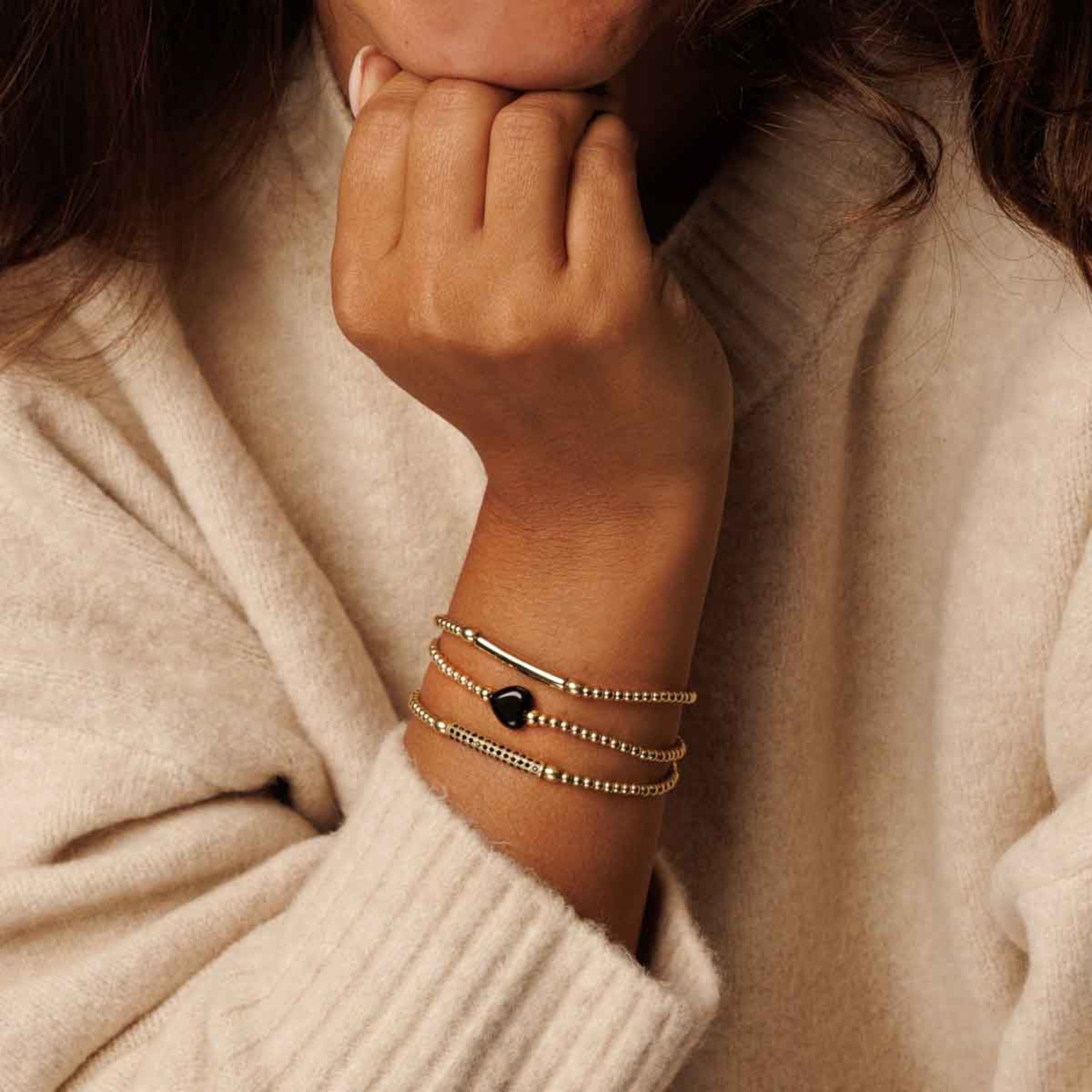 Gouden armband met Onyx hart